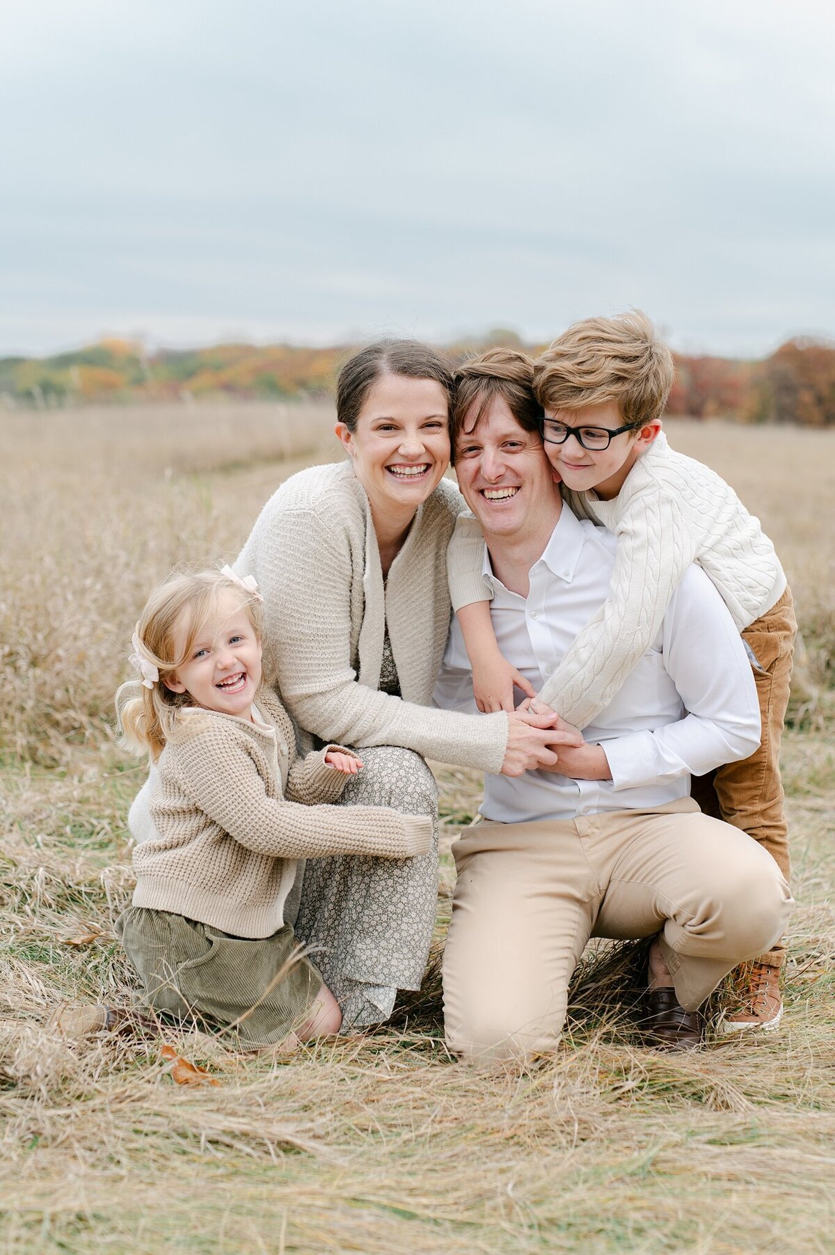 Portrait of a family of 4 taken by Abby Park Photography