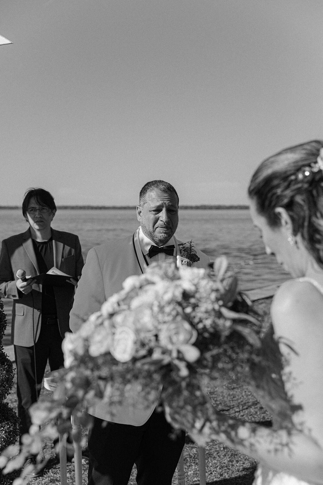 groom crying as he sees his bride for the first time