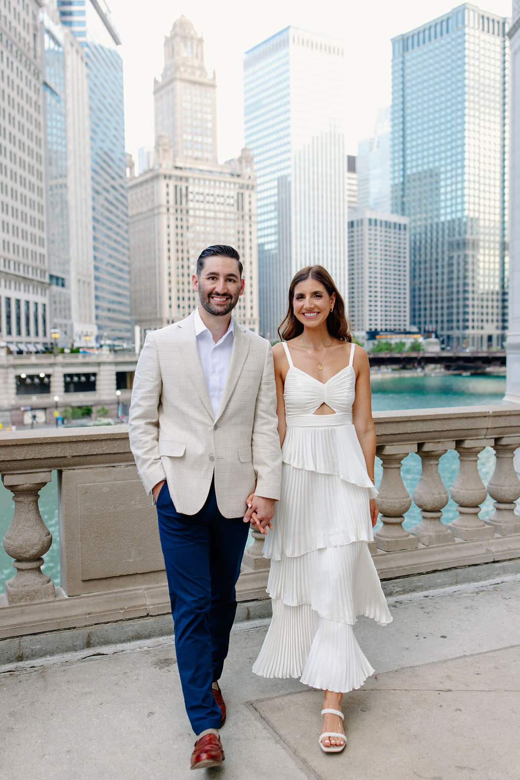 An engagement photography session at The Wrigley Building and North Ave Beach in Chicago, Illinois - 17