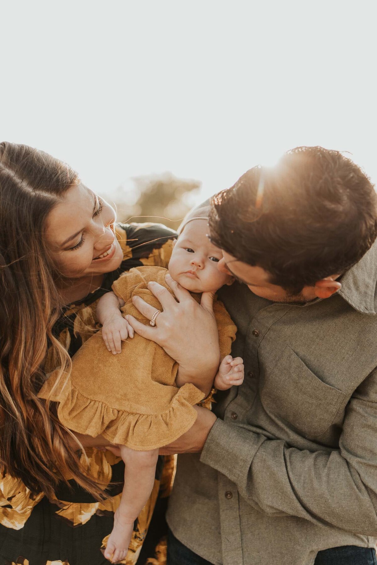 baby-girl-and-mom-and-dad-fall-family-photos