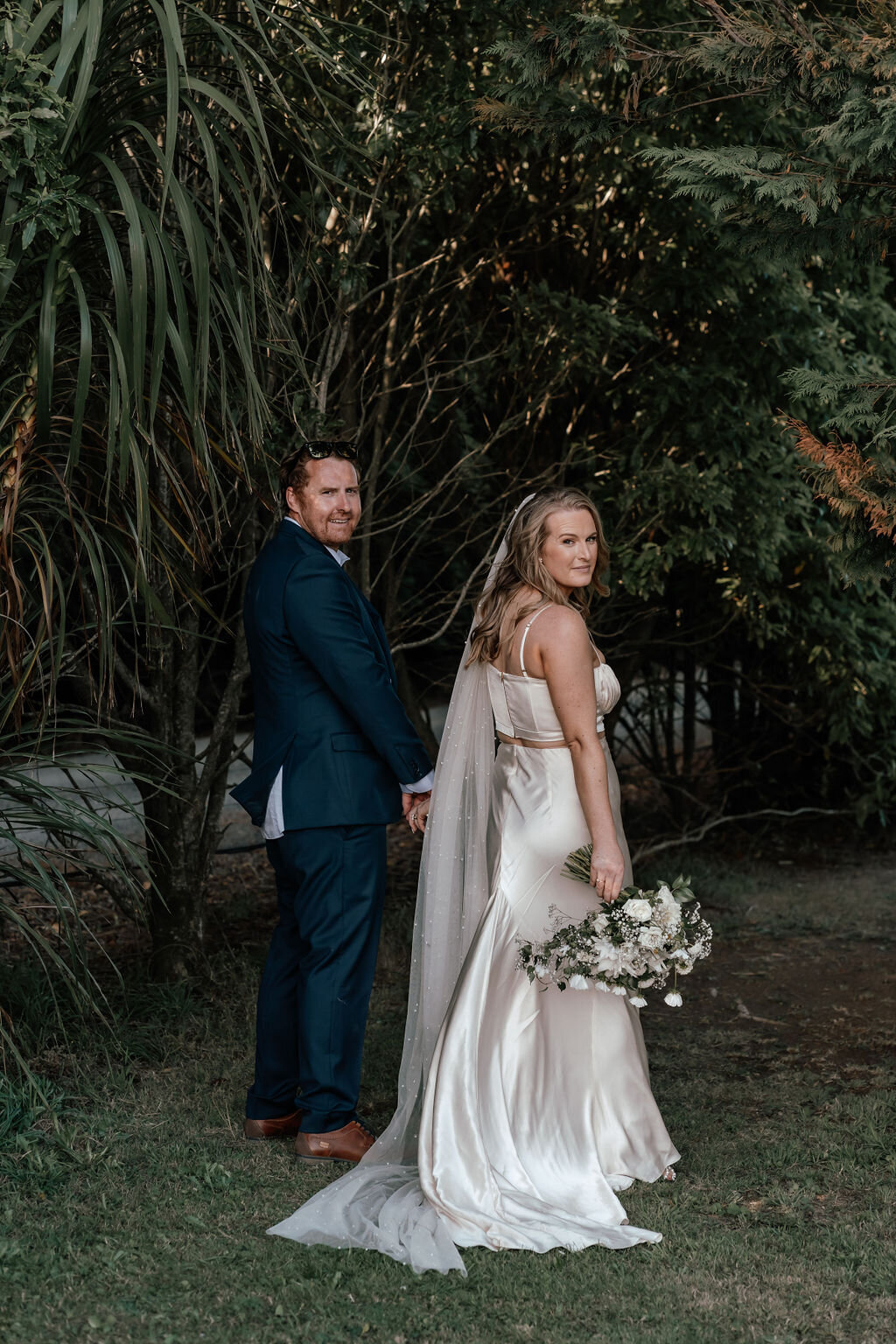 Bride and groom Olivia and Dave having a moment alone during their Auckland wedding celebration, photographed by Zanthe Vorsatz.