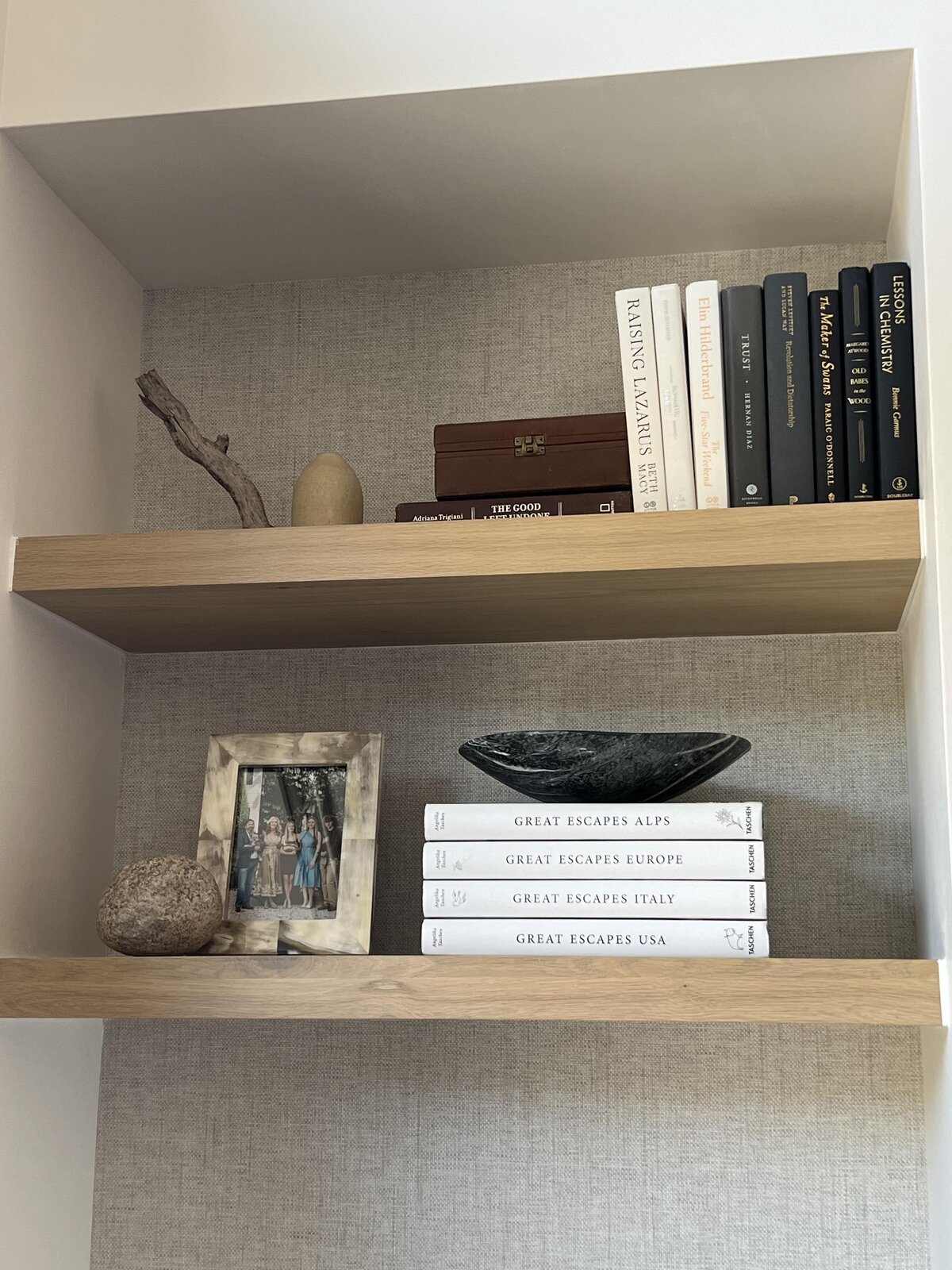 open shelving with books and decorative items