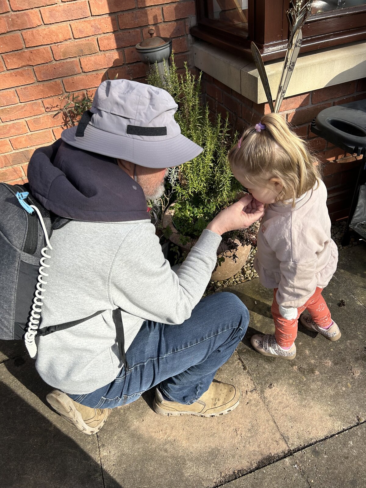 Nigel playing with his grandchild