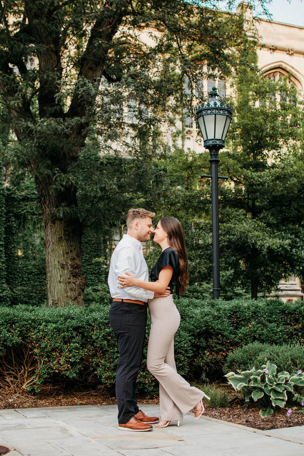 engaged couple posing for romantic photos in Chicago, IL