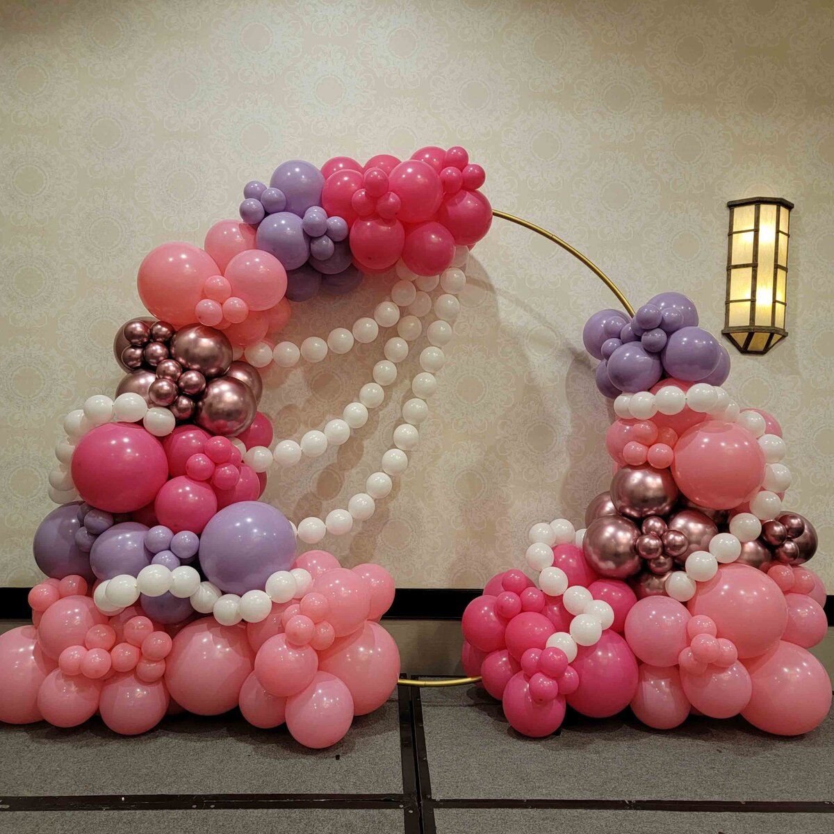 A touch of glamour to your celebration with Air with Flair Decor's Custom Balloon Installation, featuring a Ring and Neck Chain Party theme. The custom-designed brilliance of our balloon artistry, setting the stage for an extraordinary and unforgettable event ambiance.