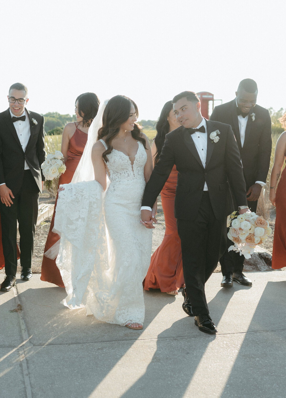 bride and groom with wedding party