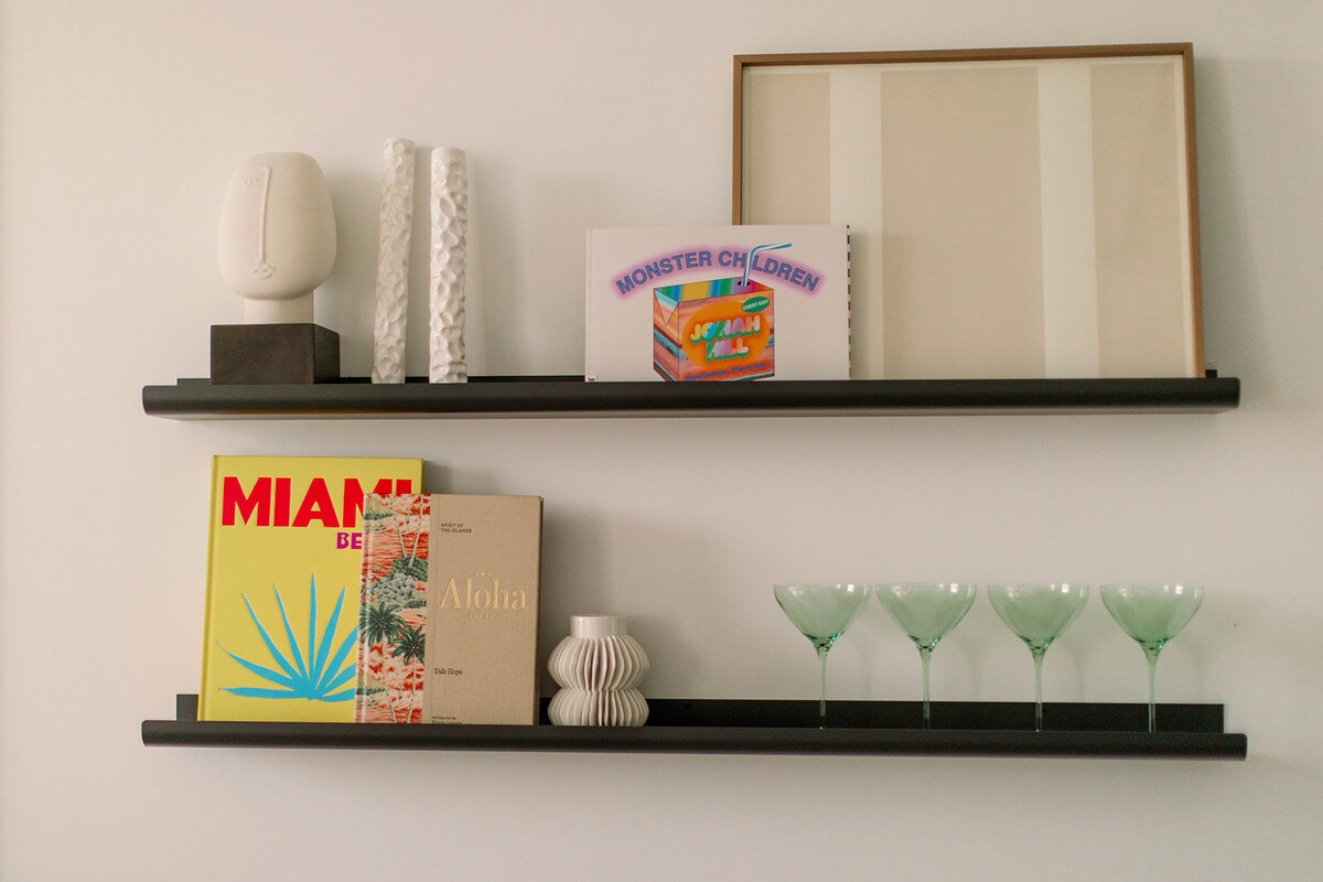 Deco accents on brown shelves