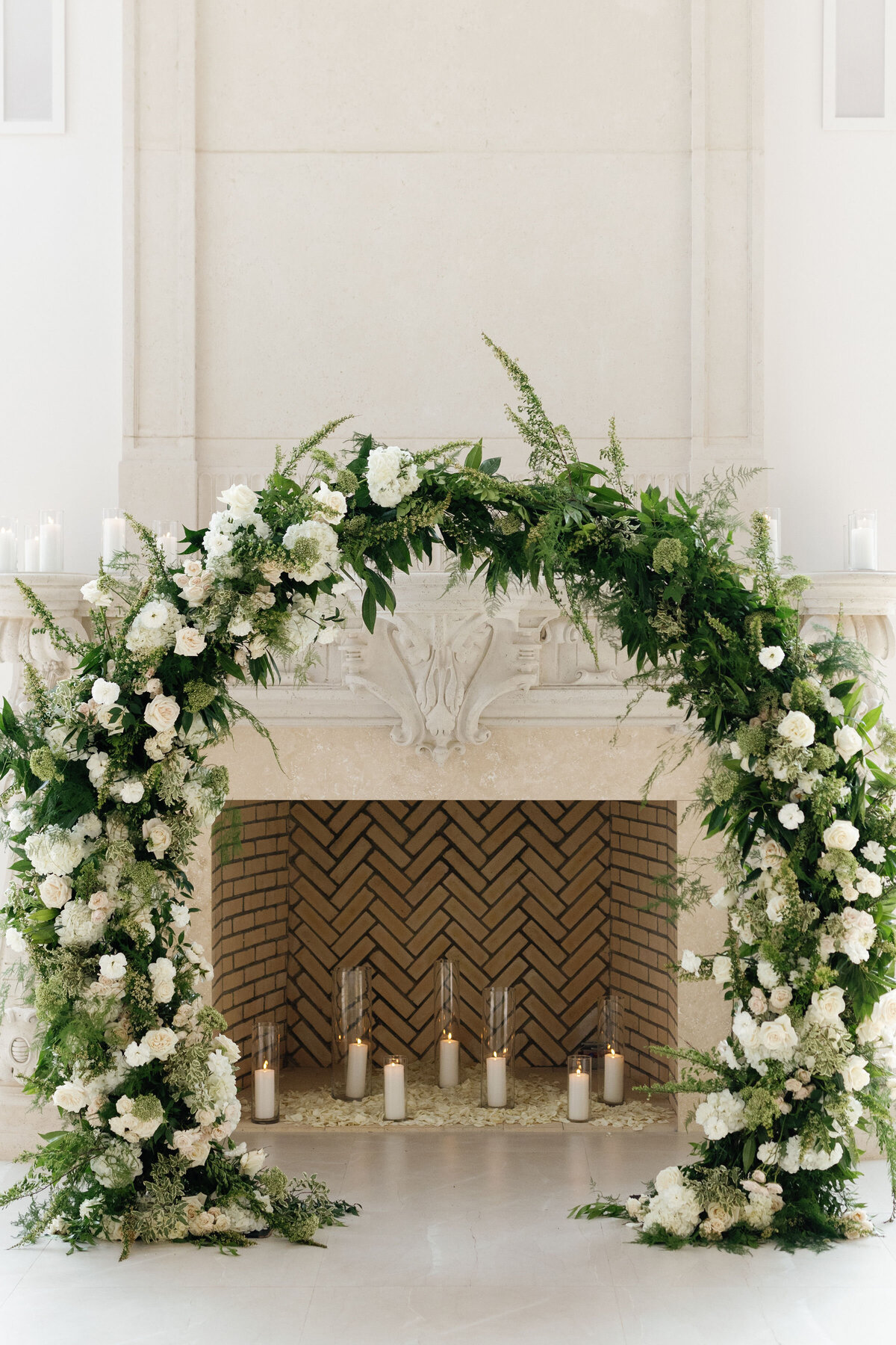 greenery-and-white-wedding-ceremony-arch-flowers-wedding-florist-floral-installation-enza-events
