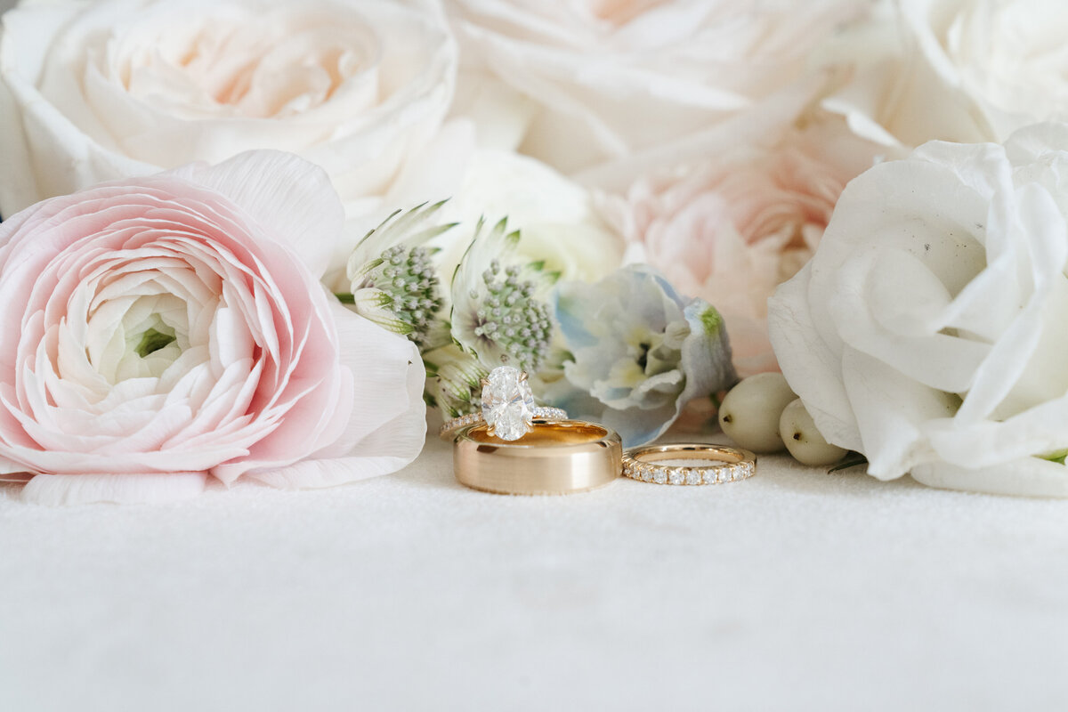Detail flat lay with wedding rings and stationery at Waverly Oaks
