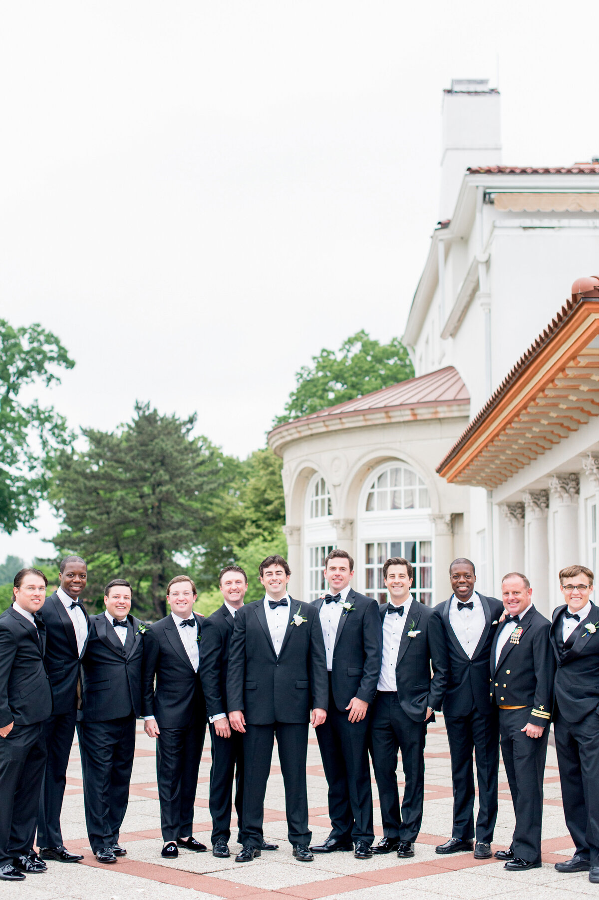 Groom and groomsmen at Congressional Country Club during luxury Washington DC wedding day