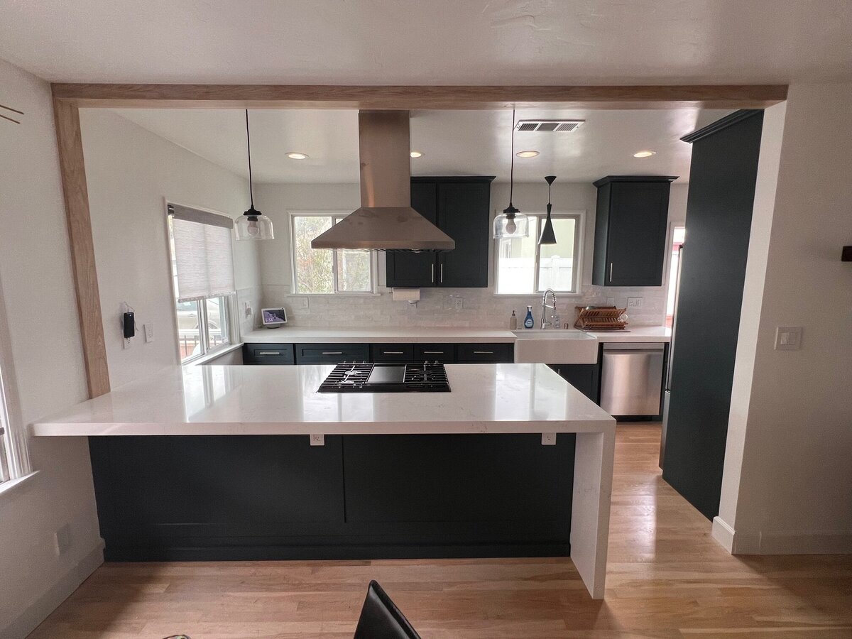 ull-view-modern-black-kitchen-white-quartz-island