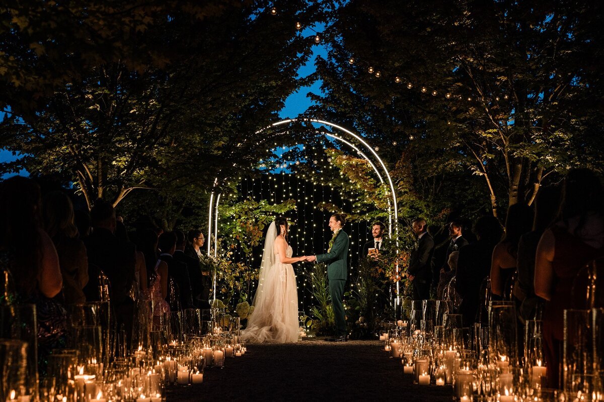 Dramatic-Ceiling-Greenery-Candle-Light-Wedding-Flora-Nova-Design-Seattle-00085