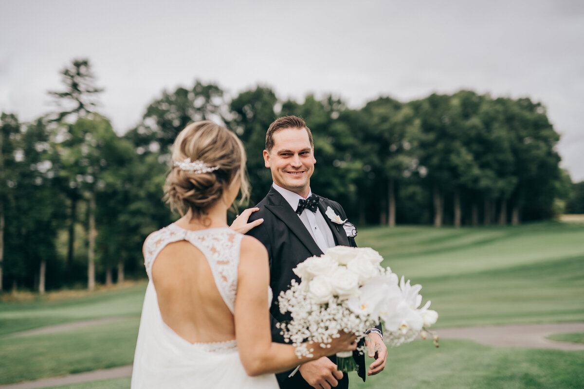 A groom's reaction to his bride during their romantic first look
