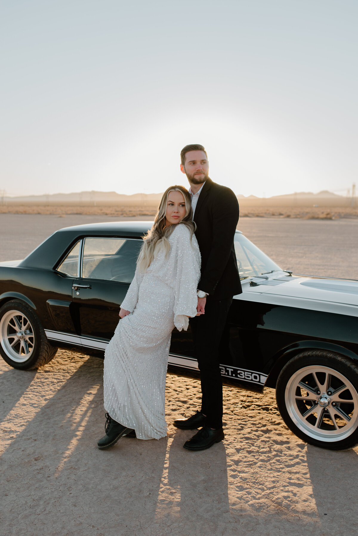 Las Vegas elopement with vintage car at sunrise