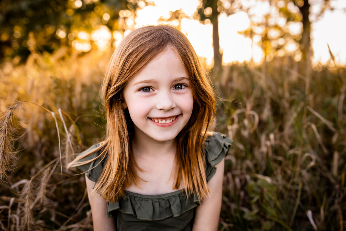 little girl smiling at Oak Ridge Prairie