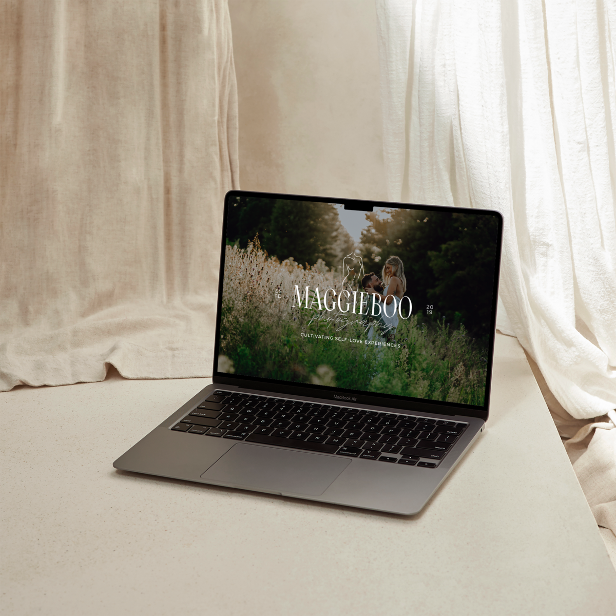 Logo over photo on laptop