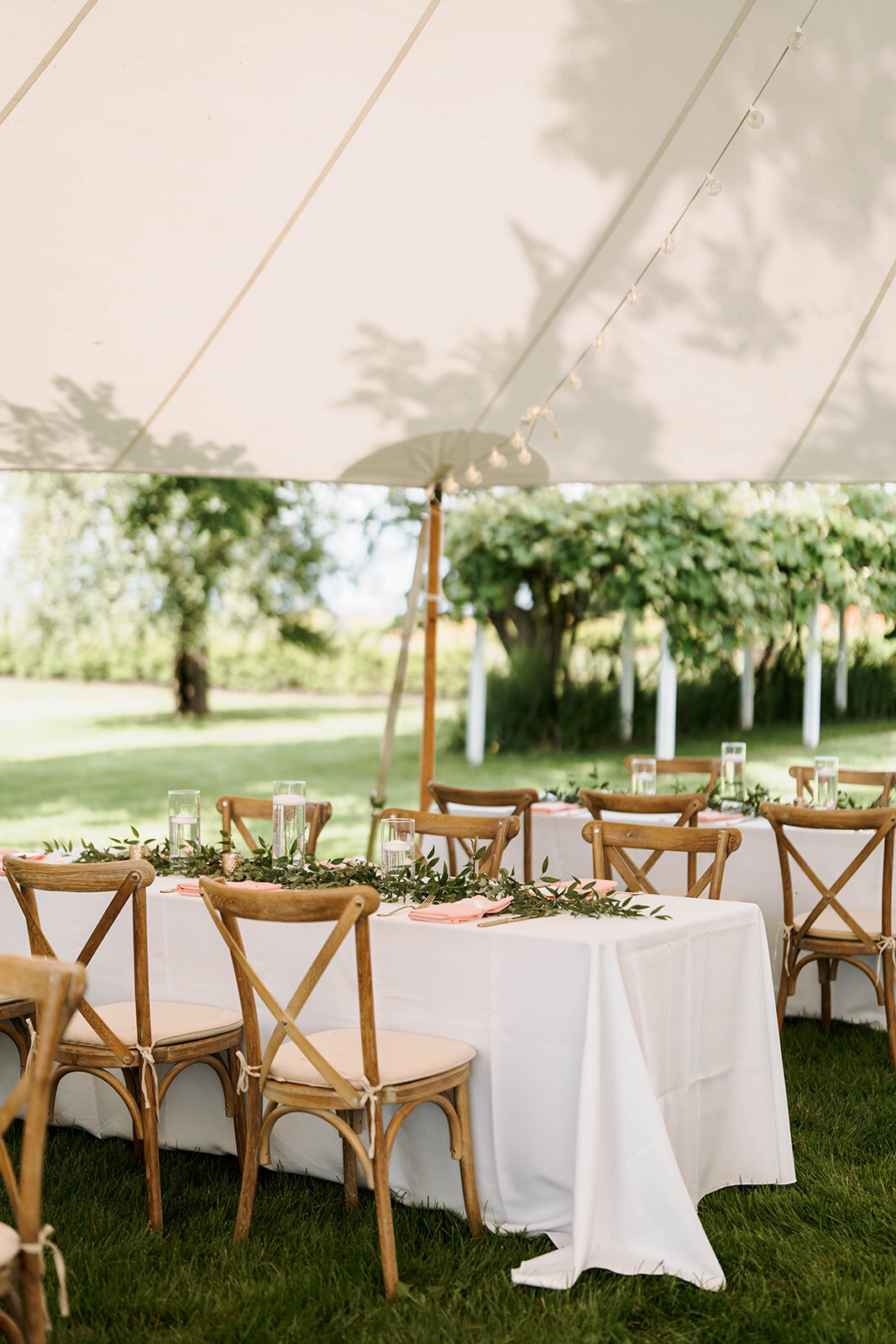 simple and elegant tented wedding reception decor in upstate new york