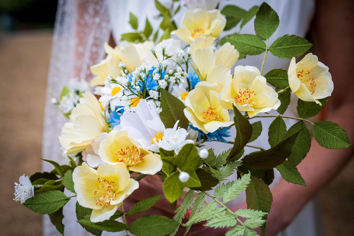 Lasting paper wedding bouquet of yellow and blue wildflowers