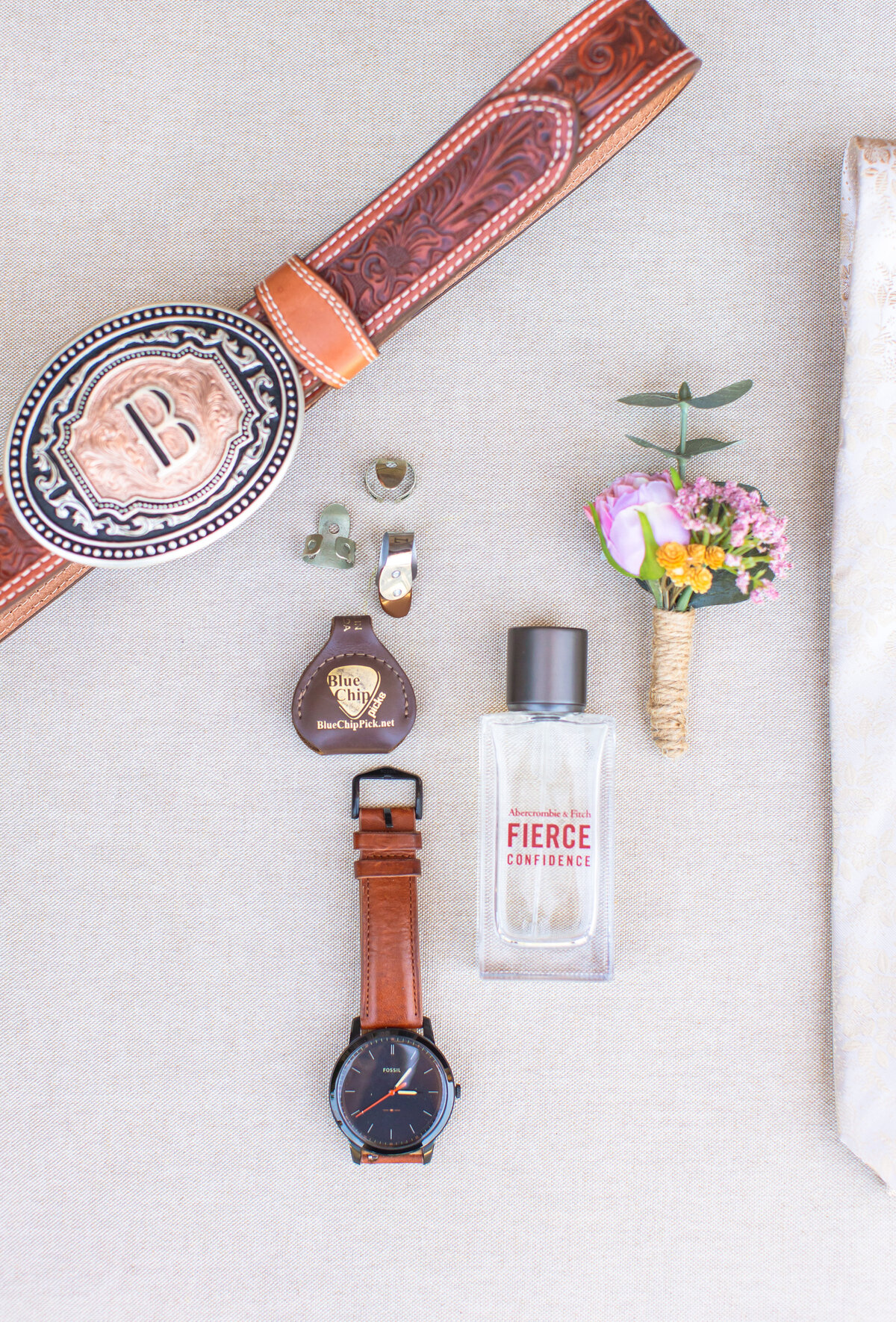 grooms details flat lay