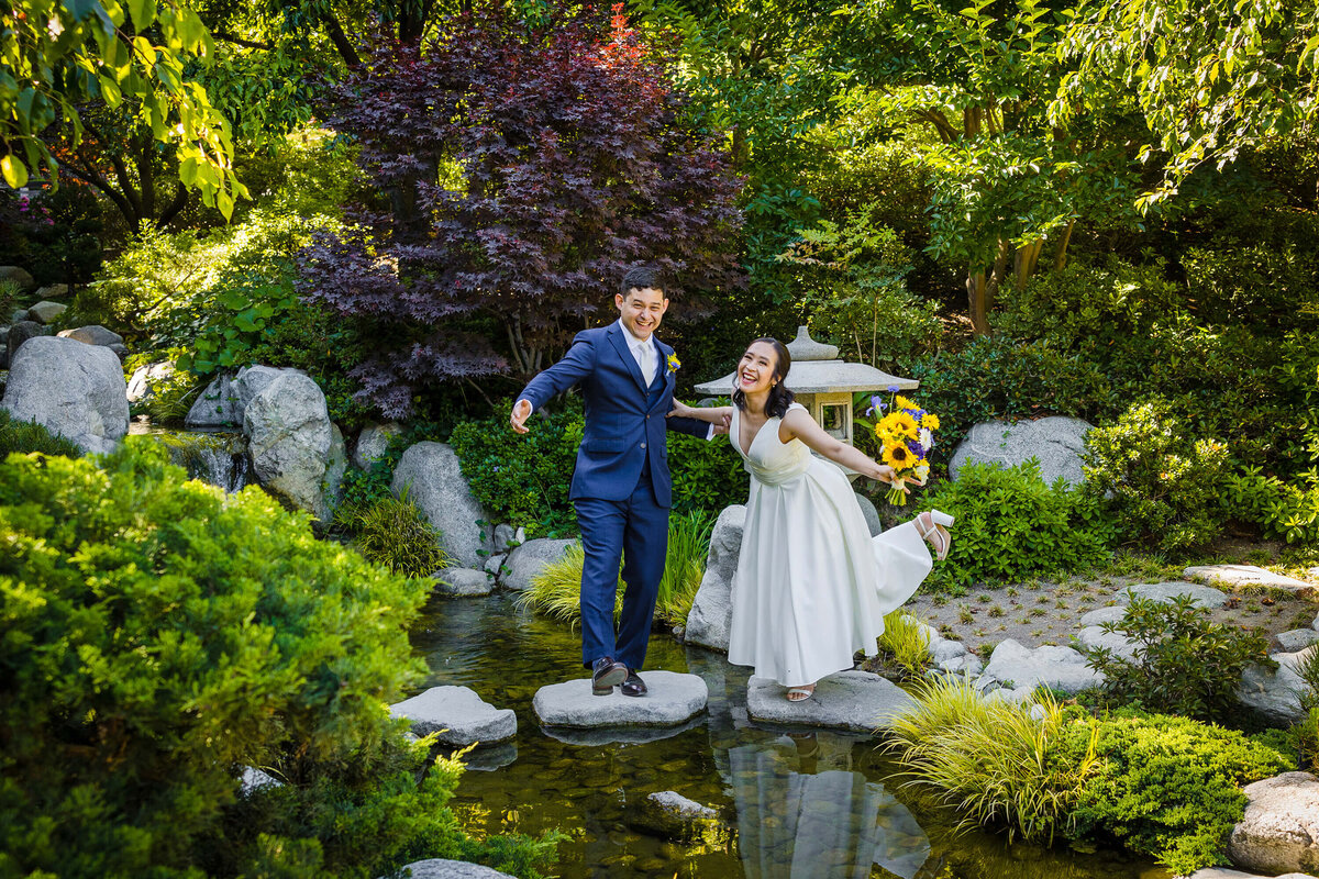 japanese-garden-wedding-playful-bride-groom-portrait-pond