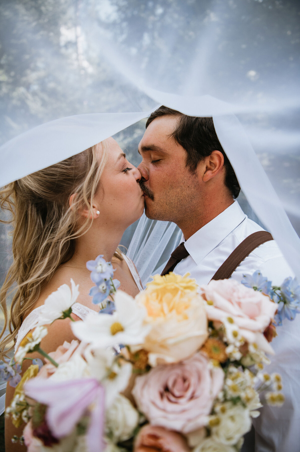 This intimate, English garden-inspired tented wedding at the groom’s childhood family cottage in Boulter, Ontario, beautifully combines elegance and nature. Captured by Celeste Justice Photography, the celebration features lush floral arrangements, quaint garden decor, and a charming tent setup. The serene countryside setting and personal touches create a warm, romantic atmosphere for the couple and their guests. Keywords: intimate wedding, English garden wedding, tented wedding, family cottage wedding, Boulter Ontario wedding, Celeste Justice Photography, rustic elegance, garden wedding decor.