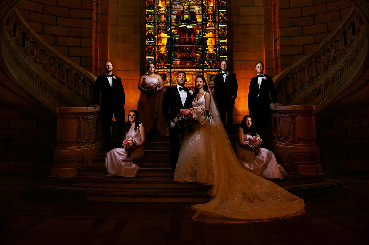 A bridal party poses for a portrait at the Old Courthouse in Cleveland.