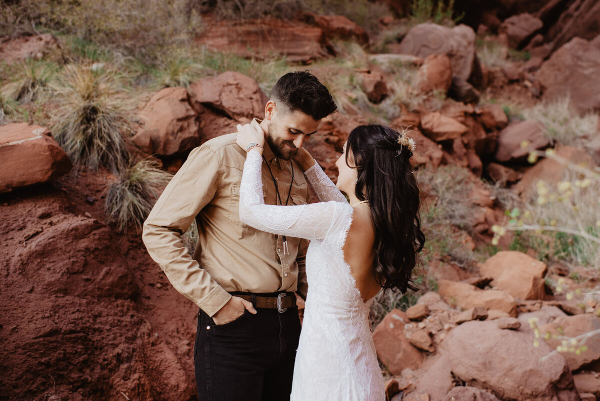 Utah Elopement Photographer captures bride helping groom get ready