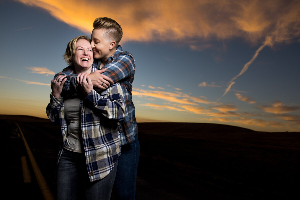 portrait-engagement-couple-sunset-spokane-hug-laughter
