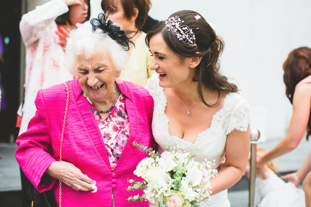 bride laughing with grandma
