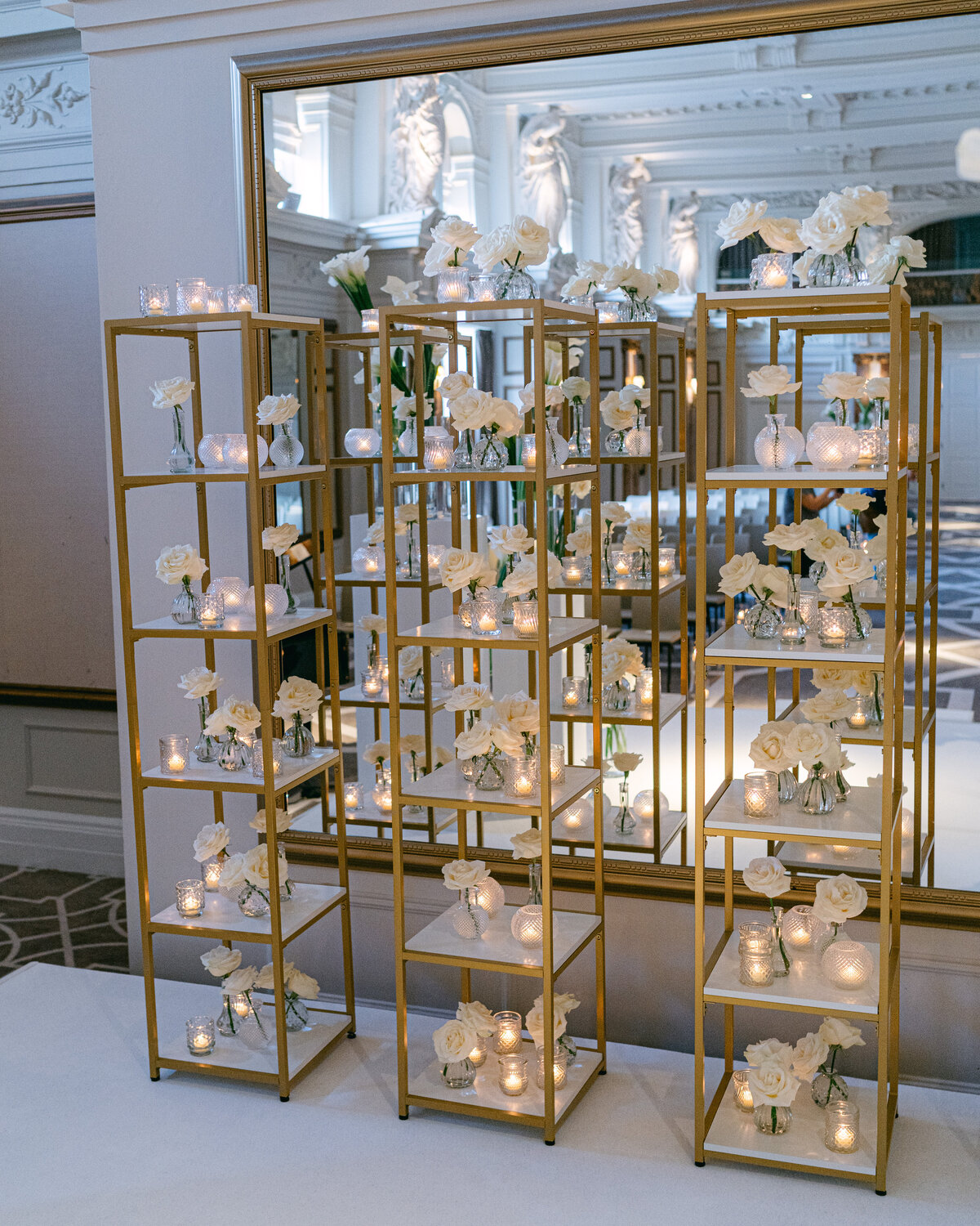 White wedding floral ceremony with modern design at the Kimpton Fitzroy hotel in London