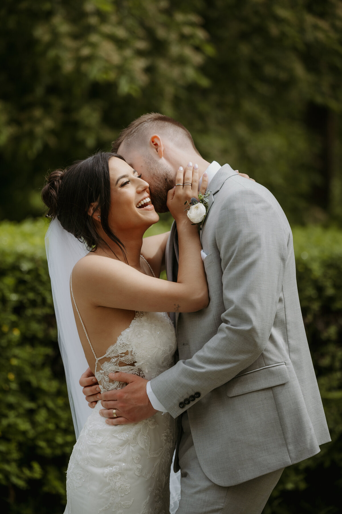 newlyweds laughing at alberta wedding