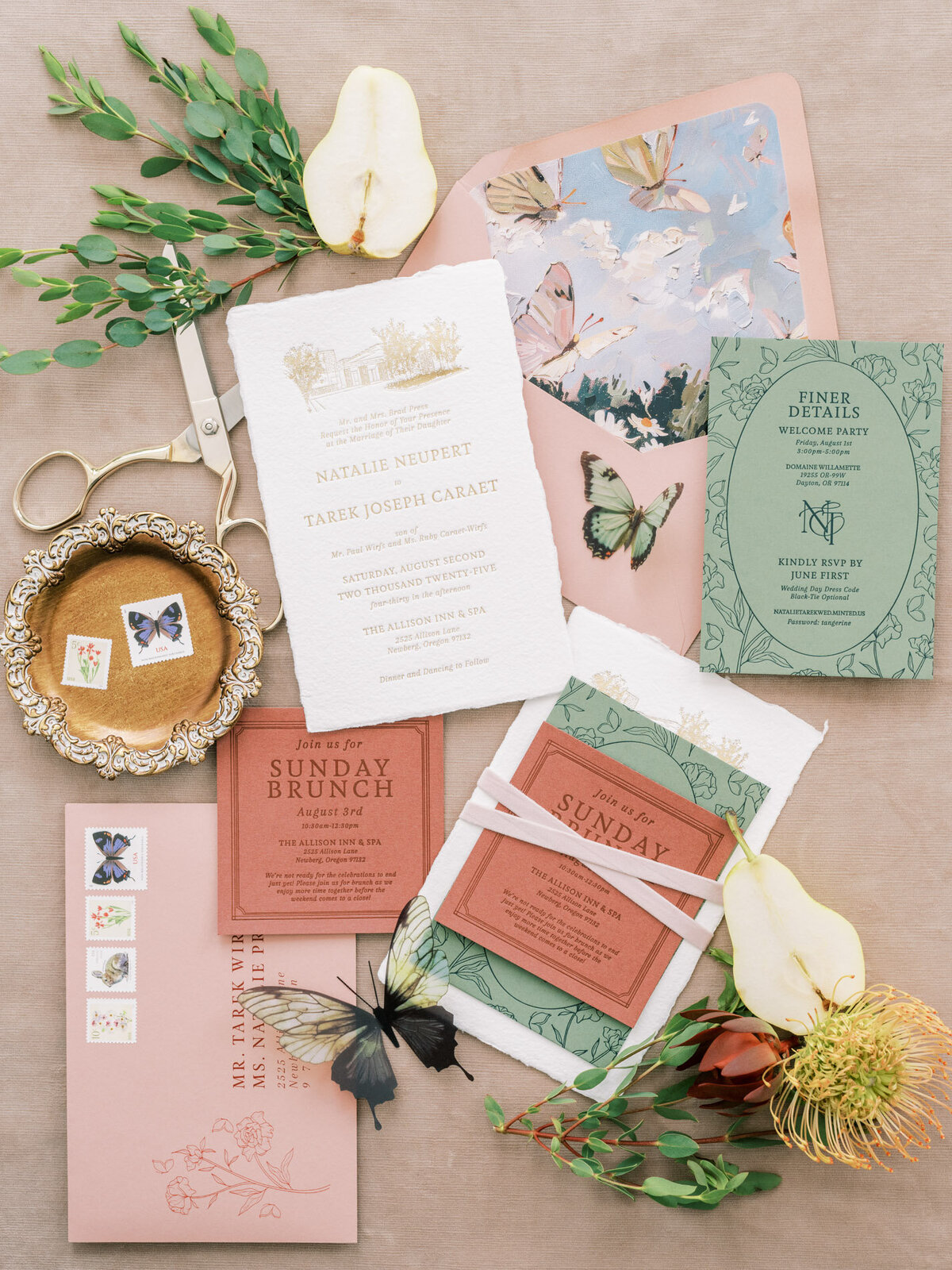 Luxury wedding invitation suite featuring custom calligraphy details, florals, stamps, fruit and butterflies representing full service design and calligraphy by Life in Letters.
