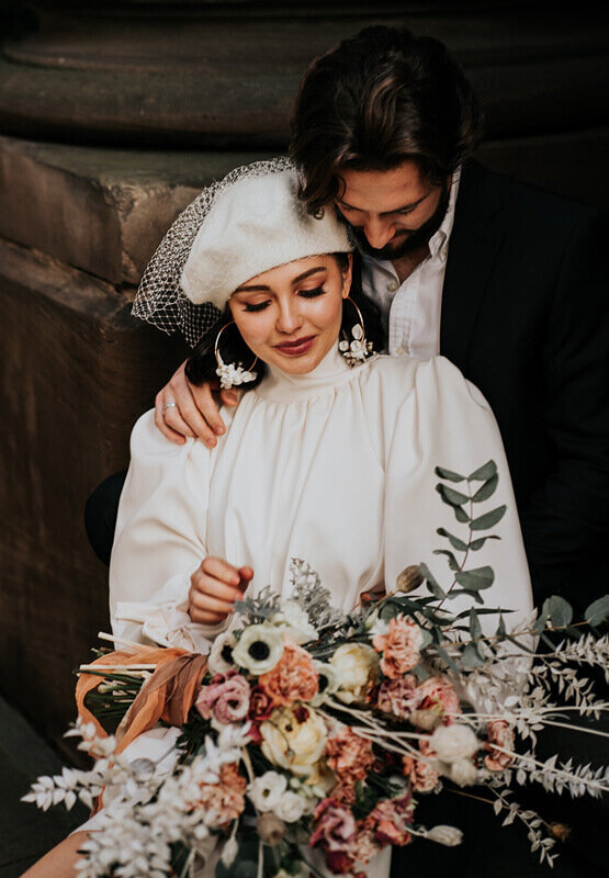 bride and groom portico