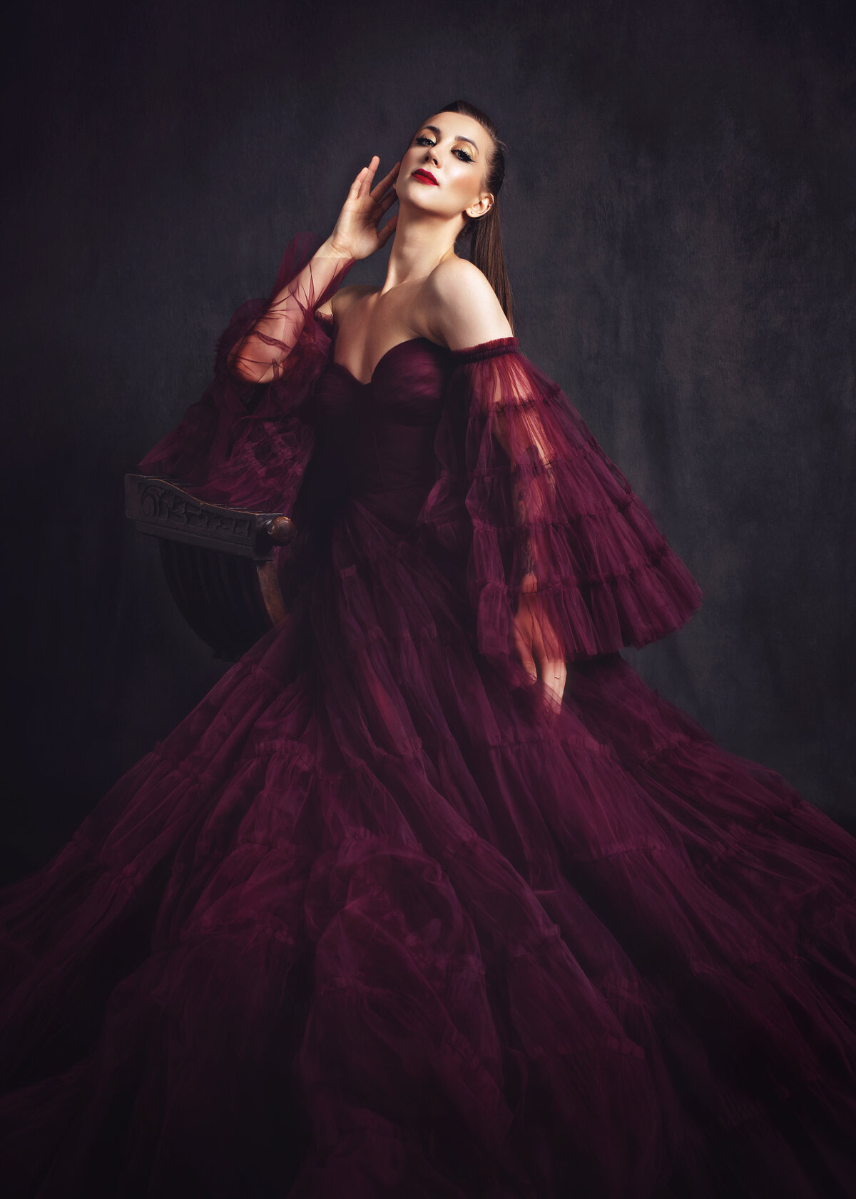 Fine art glamour photographer at AMM Fine Art Studio — luxury portraits with bold styling and timeless elegance.