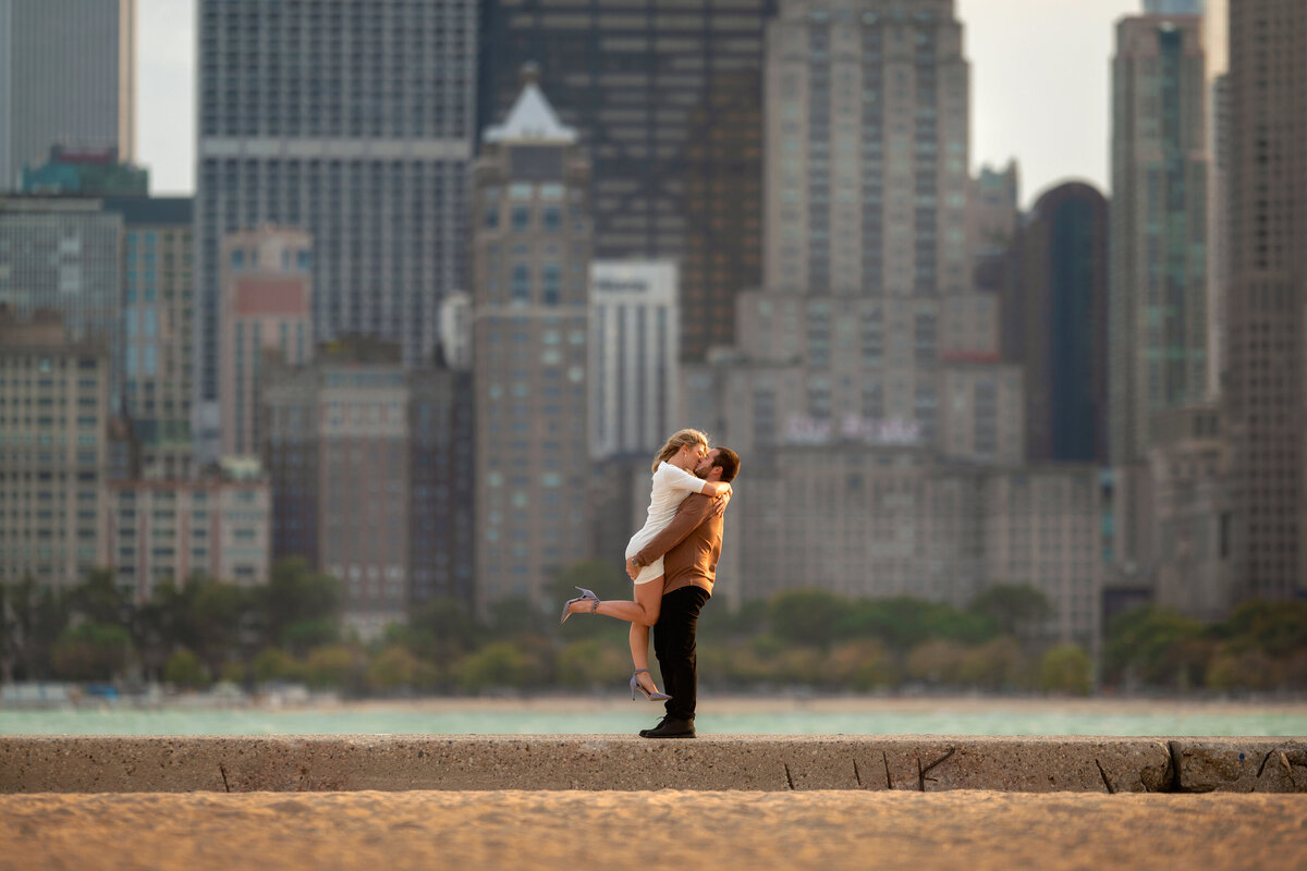 scenic stretch featuring a lakefront promenade with views of the city skyline