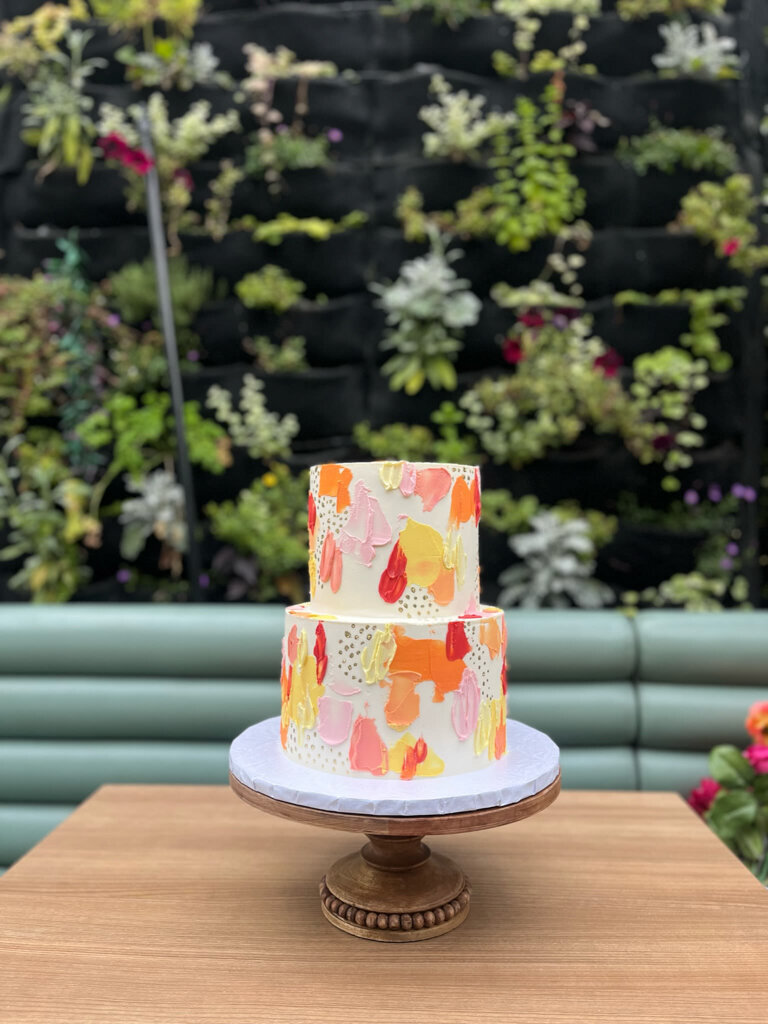 Colourful 2-tier wedding cake by Bake My Day, contemporary cakes & desserts in Calgary, Alberta, featured on the Brontë Bride Vendor Guide.