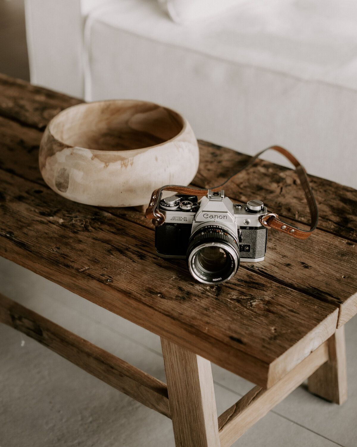 Canon analog camera on wooden table