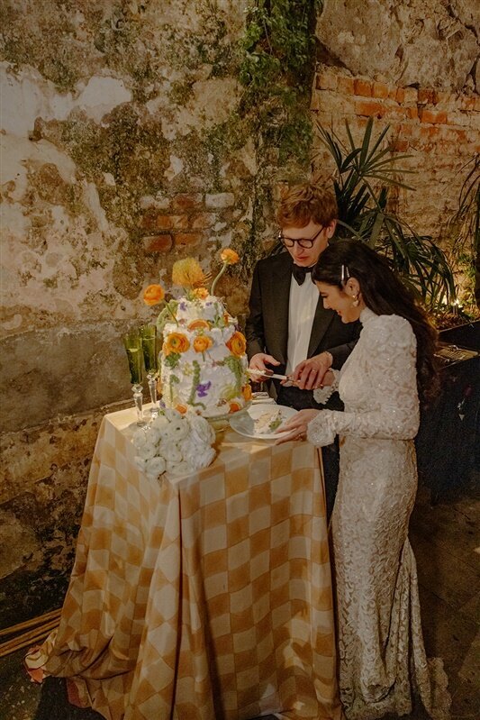 Wedding cake cutting at Sydney Watters wedding