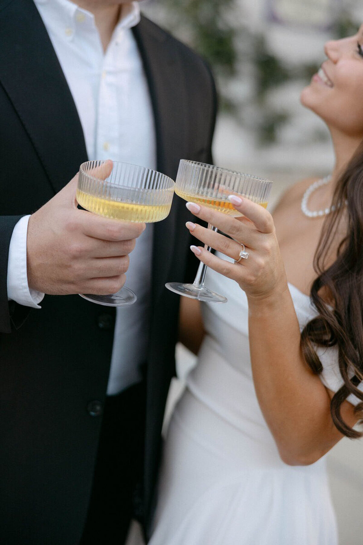 Couple holding drinks taken by engagement photographers in orlando fl, Marissa Nicole
