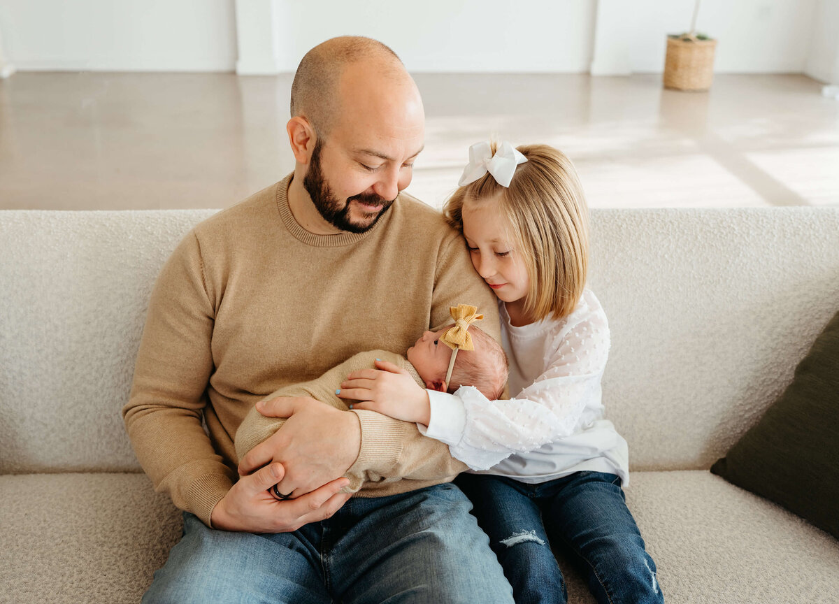 dad-with-new-baby-and-daughter