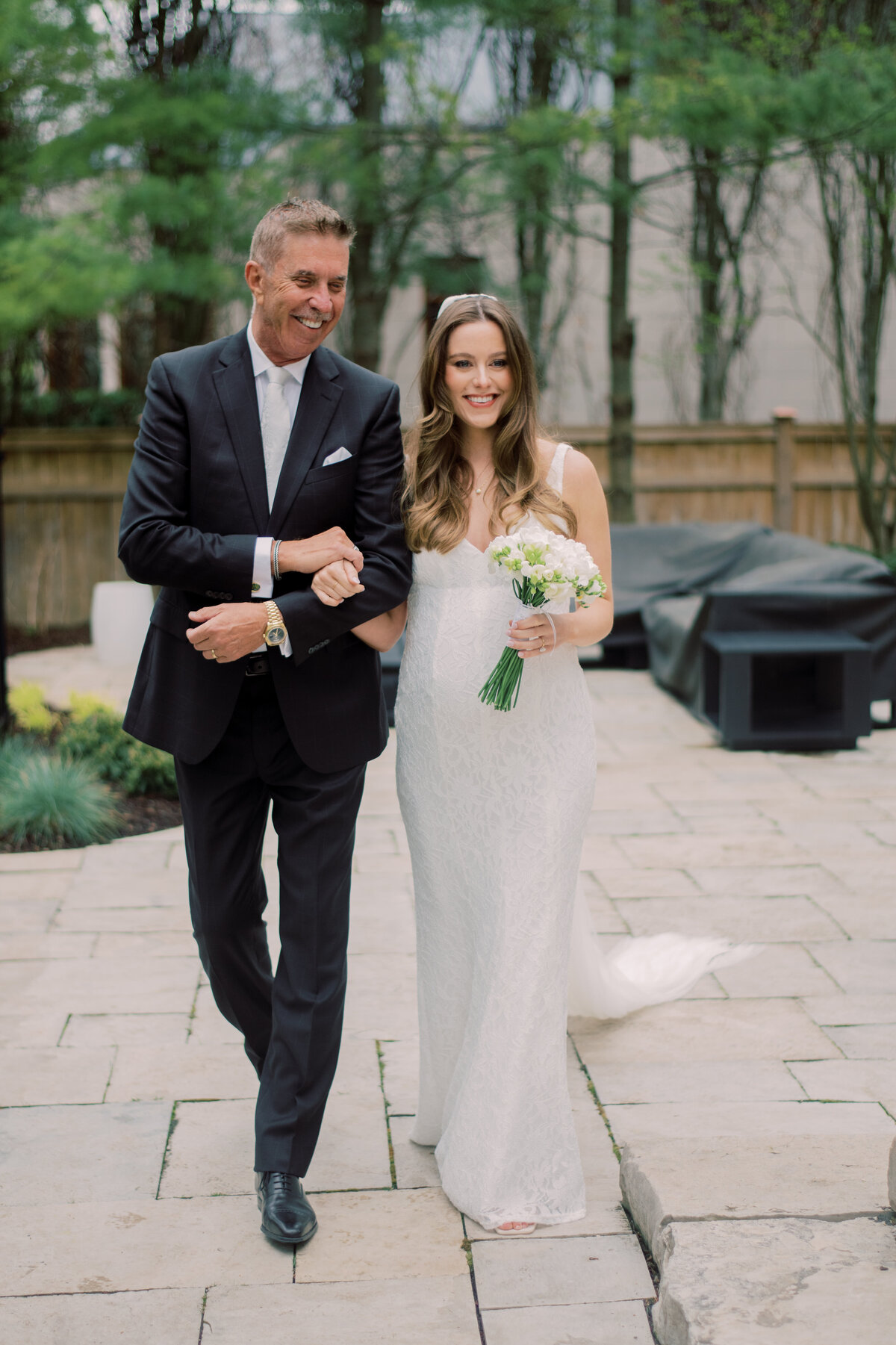 Father and daughter walking down aisle in Oakville On