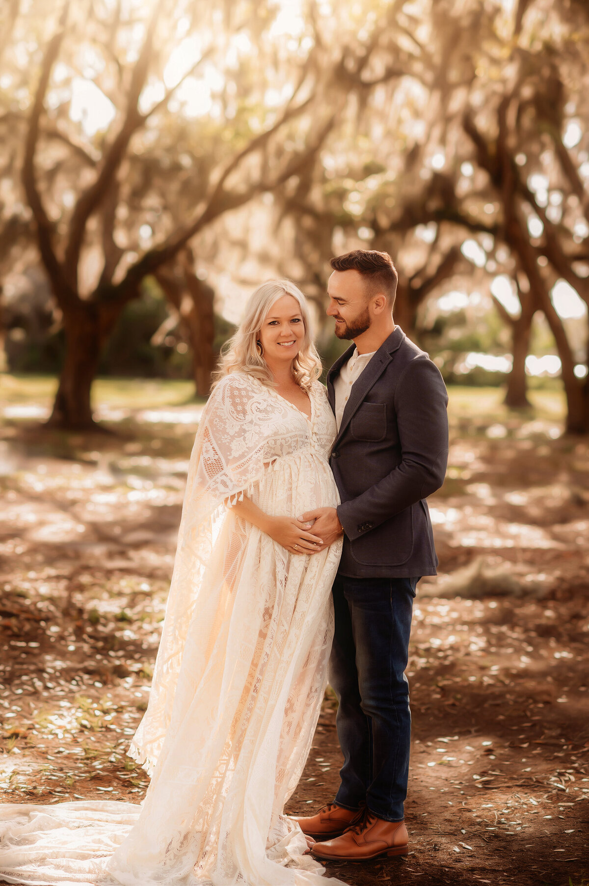 Expectant parents pose for Maternity Photos in Charleston.