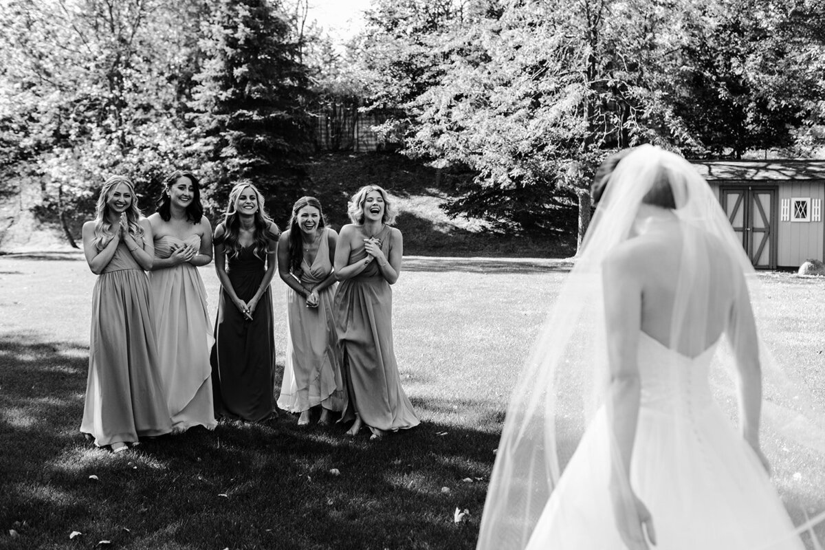 first-look-with-your-bridesmaids-prince-edward-county