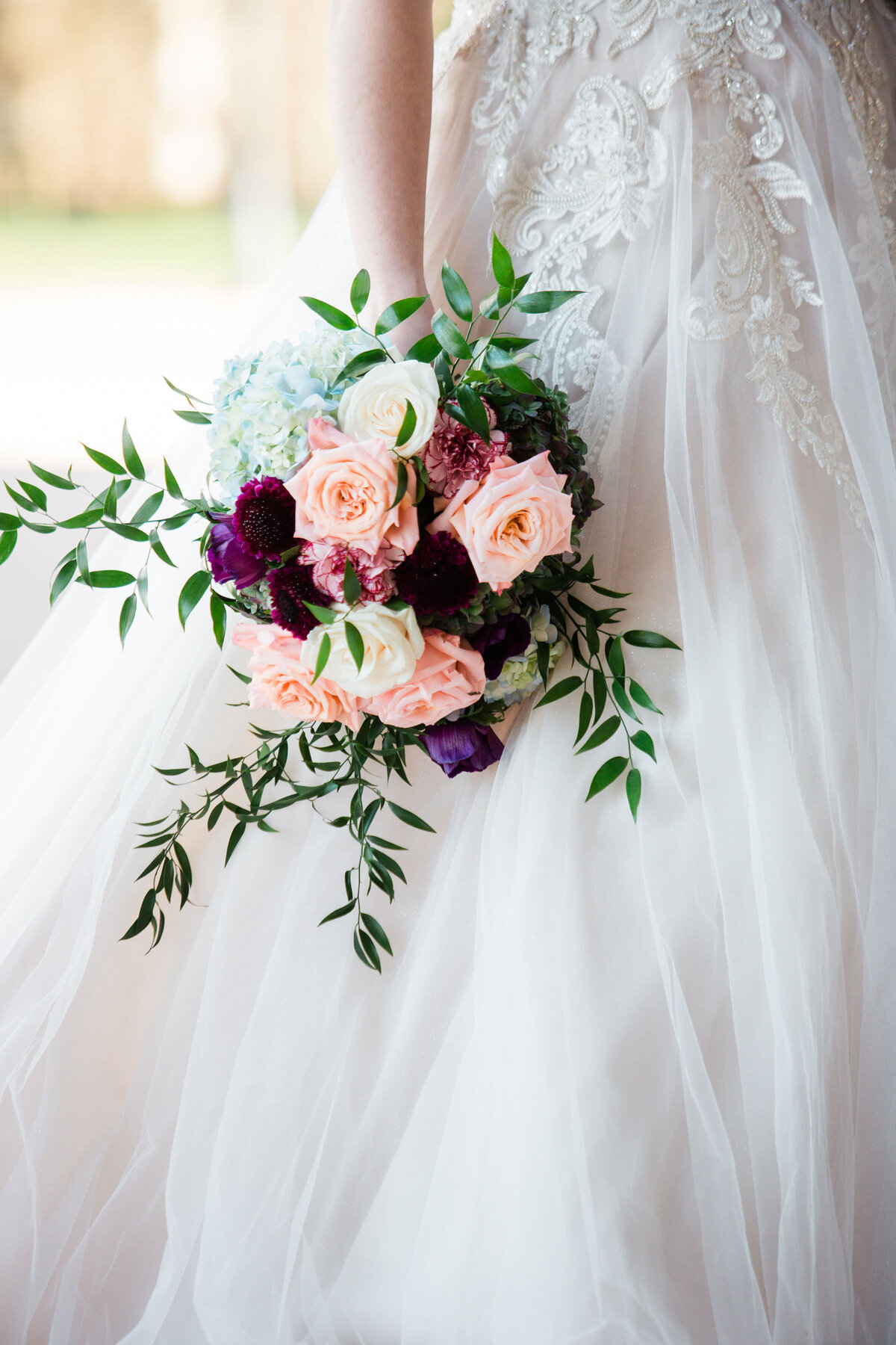 close up of bride bouquet at wedding venue