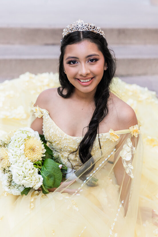 girl-smiling-yellow-bouquet