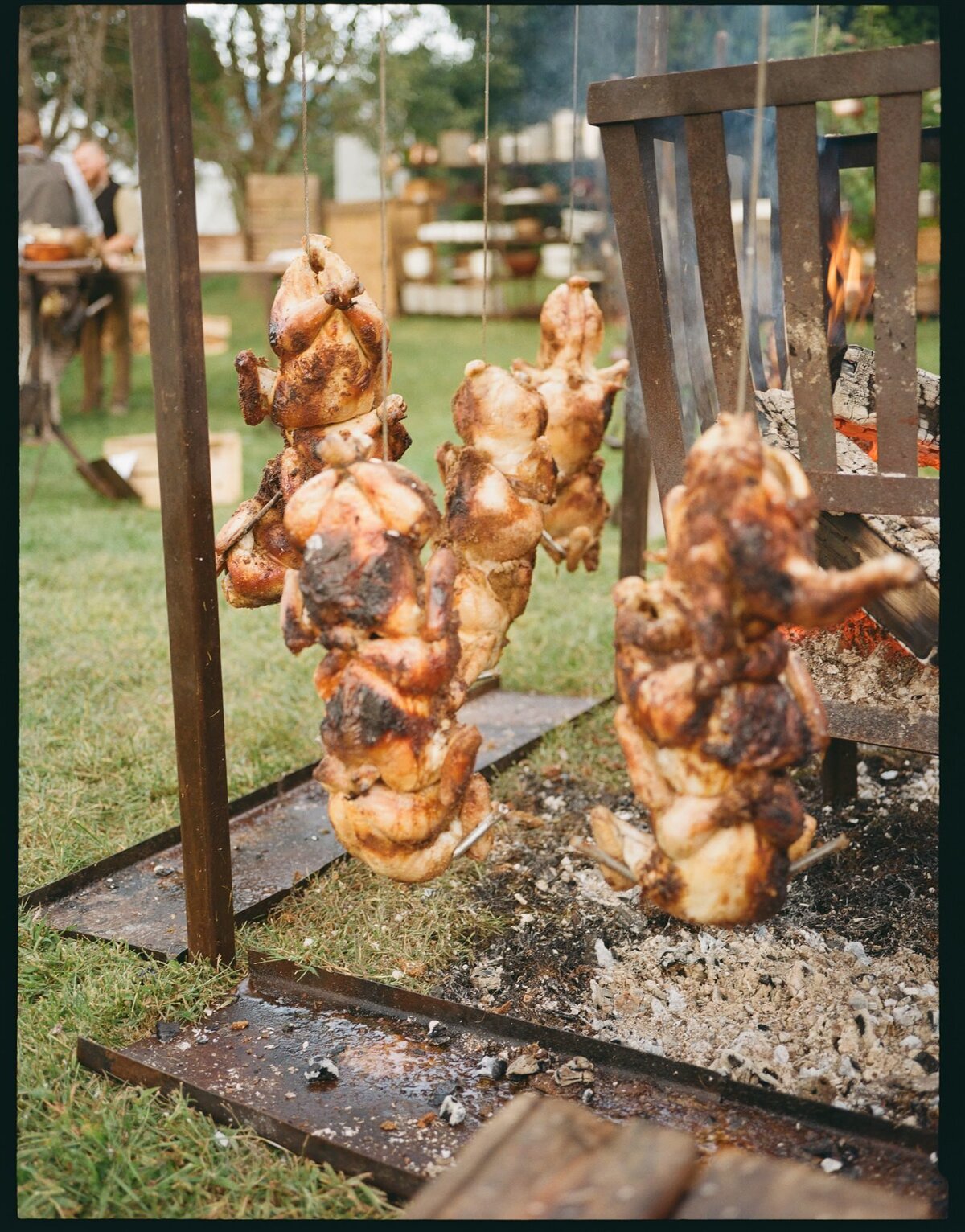 wood-fire-roasting-chicken-wedding-reception-food