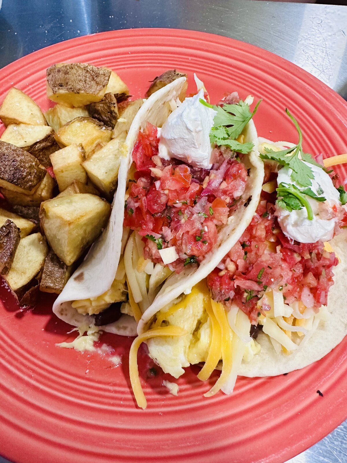 Grateful Gourmet brunch tacos packed with fresh delicious flavors served with fresh cut southern potatoes 