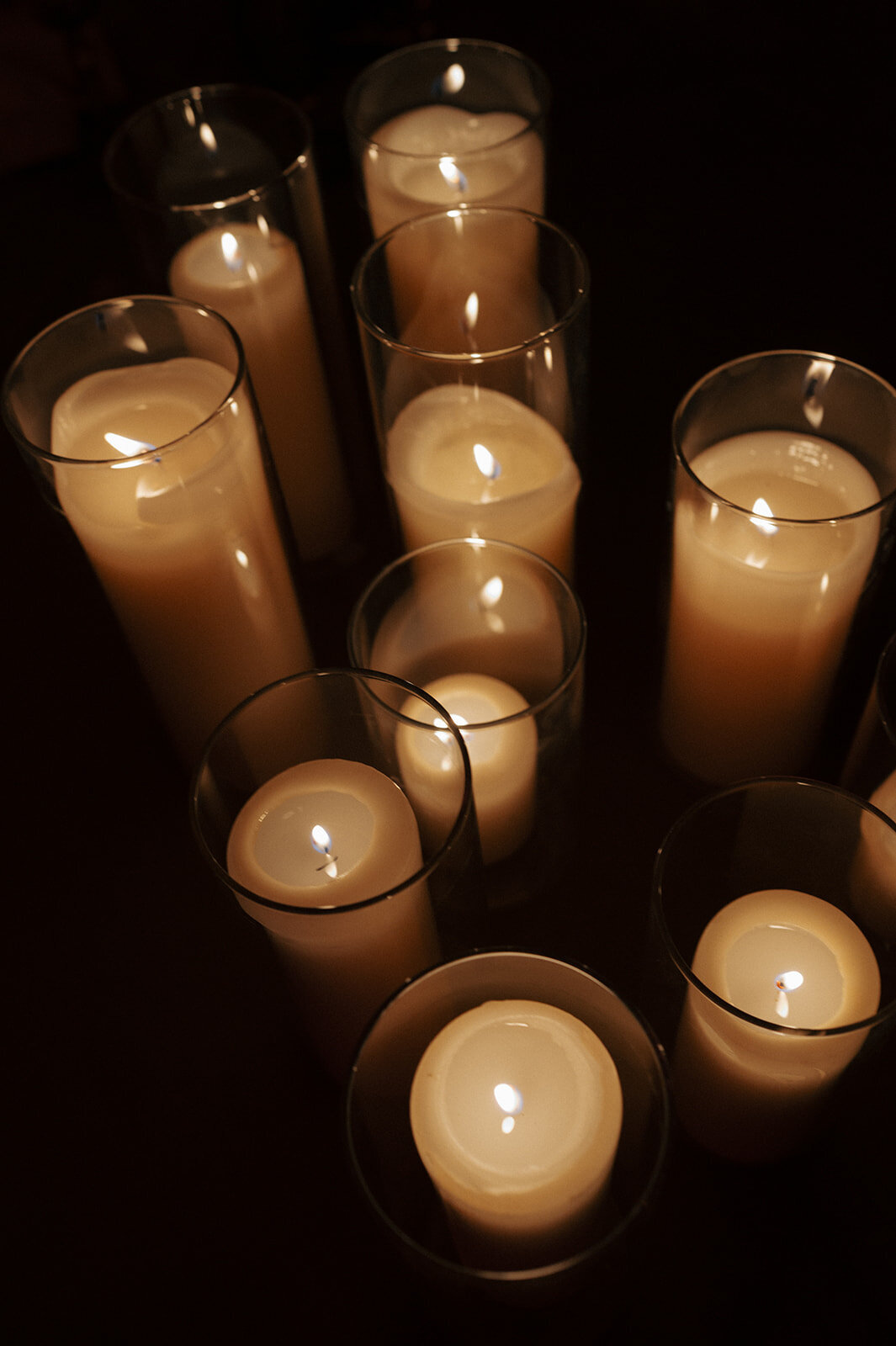 Candles lit for a vow renewal planned by Perfect Thirds and Co. 