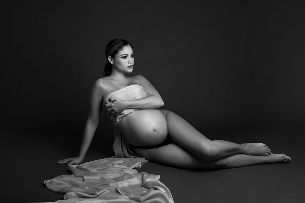 Maternity Boudoir photo shoot using fabrics by Daisy Rey