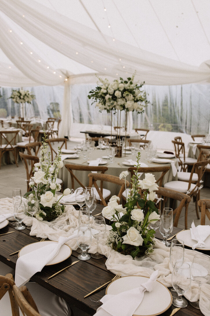 Gold accents, tall arrangement, moss, garden roses, bella donna, sage linens, cheese cloth, gold flatware, farm tables